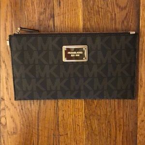 Michael Kors clutch. New in perfect condition